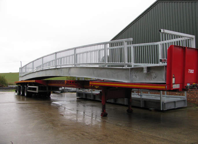 Steel bridge being transported on trailer