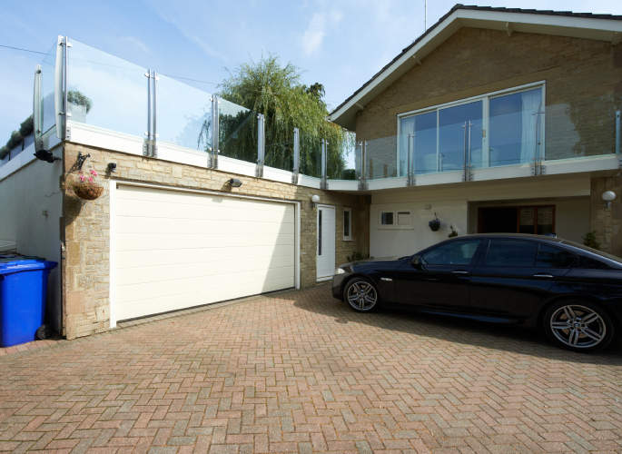 Glass balustrades on upper level of home