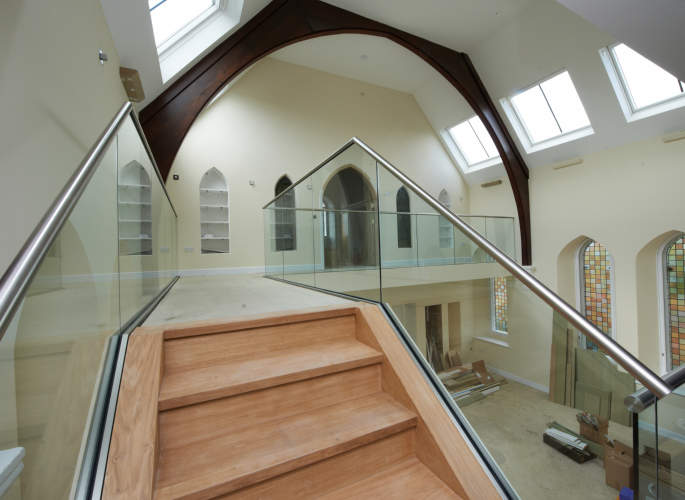 Glass balustrades in large home