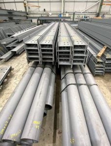 Fabricated steel beams and tubular sections neatly stacked at Riteweld Engineering’s facility, ready for distribution to construction and engineering projects across the UK.
