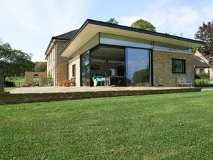 Modern home extension with large glass panels and flat roof in North Aston, Oxfordshire, supported by structural steelwork from Riteweld Engineering.